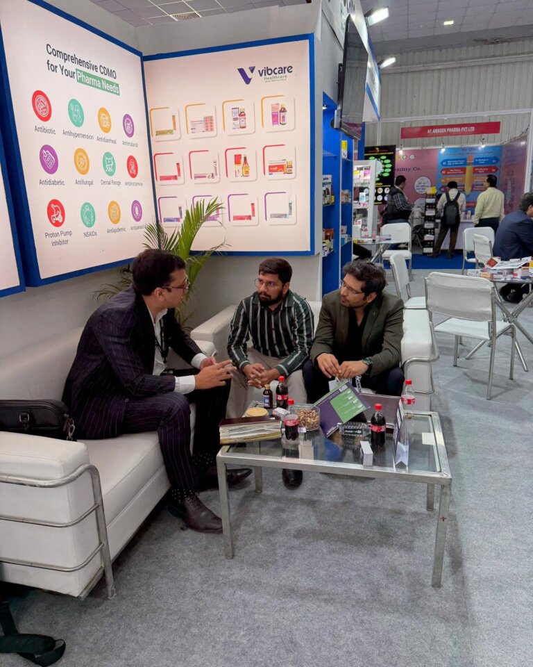 Meeting with a visitor at the Vibcare Healthcare stall, PharmmaEx Ahmedabad 2024