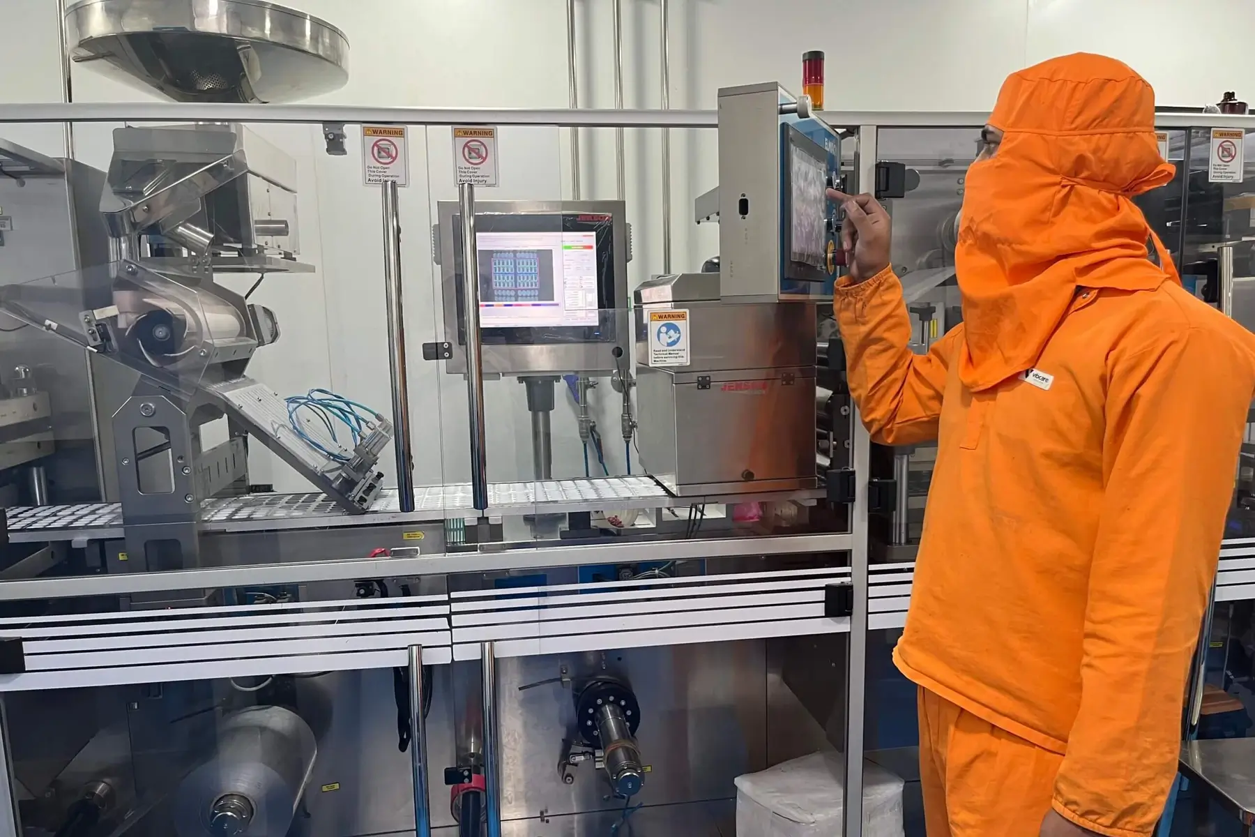 Operator at the Alu-Alu blister packing machine at the Vibcare Healthcare plant