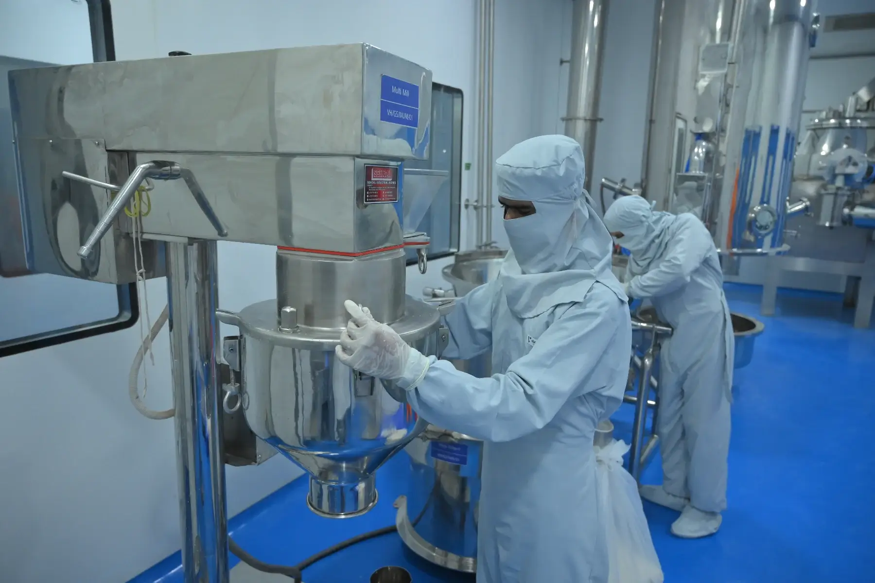 Operators in the tablet manufacturing section at the Vibcare Healthcare plant